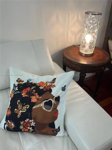 a bed room with a bed and a chair