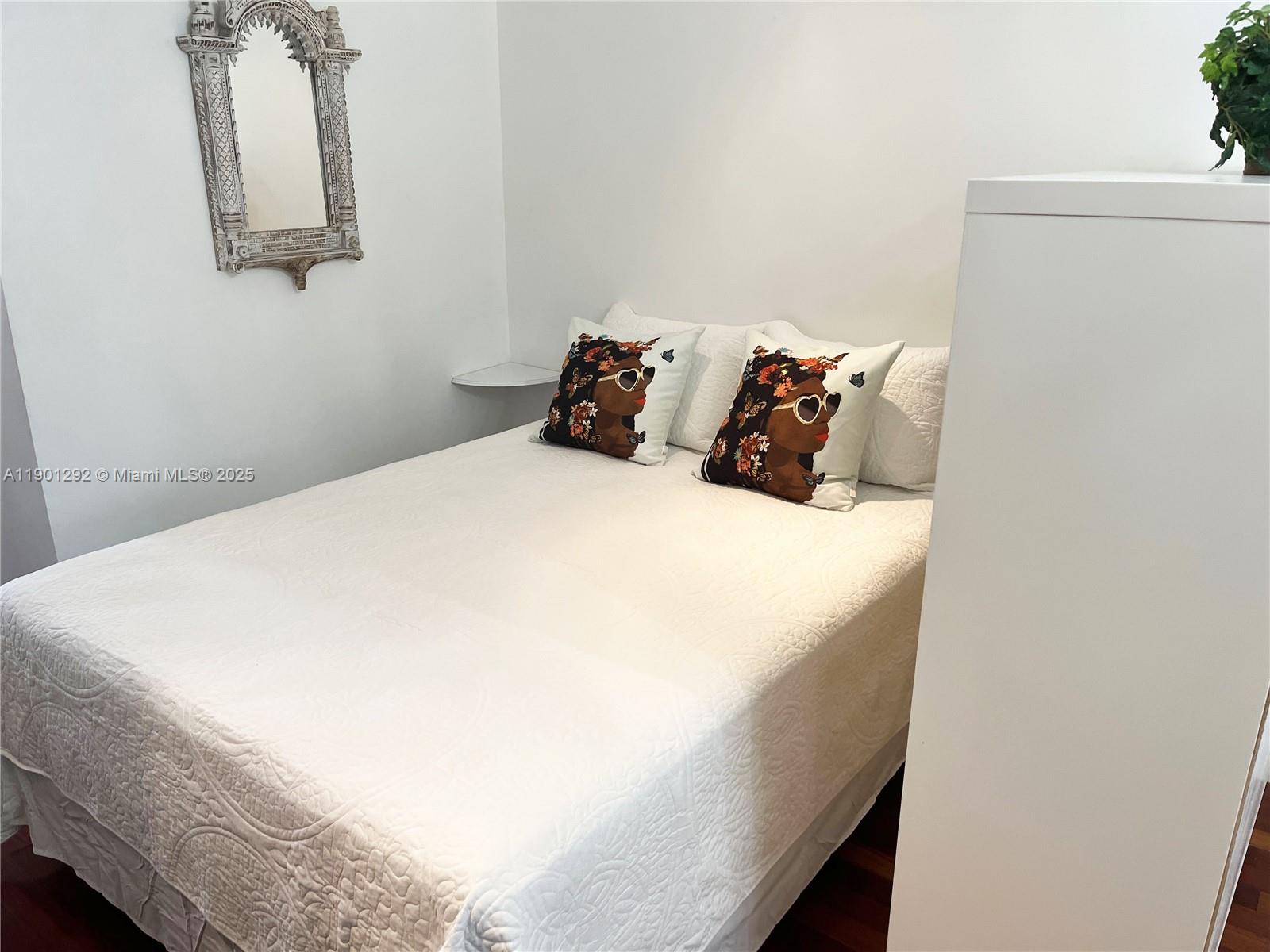 1340 Drexel Avenue, Unit 406 Miami Beach, FL 33139 - Photo 18 of 34 a close up of a bed