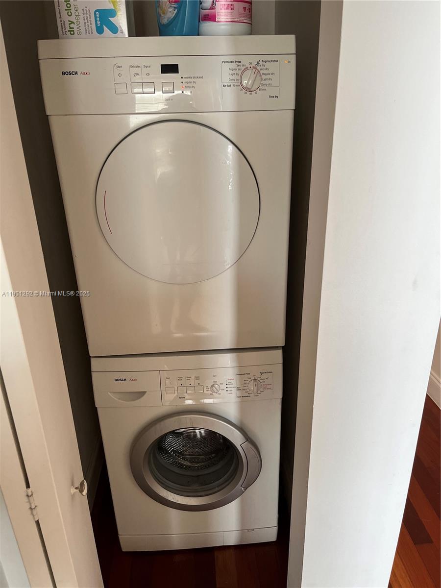 1340 Drexel Avenue, Unit 406 Miami Beach, FL 33139 - Photo 29 of 34 a close up view of washer and dryer