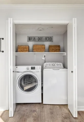a utility room with washer and dryer