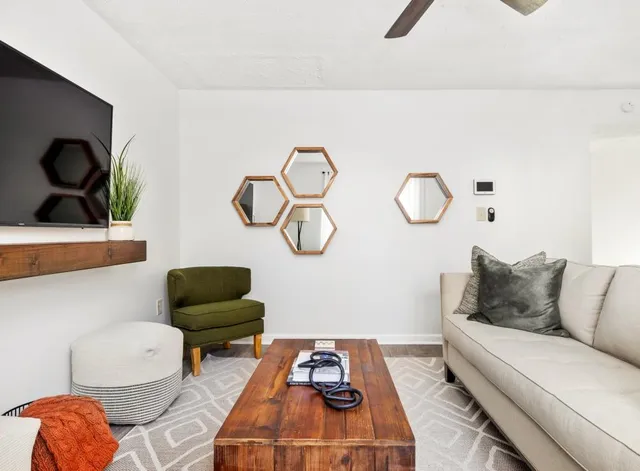 a living room with furniture and a couch