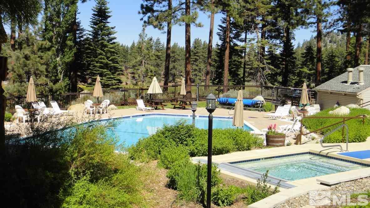 233 Clubhouse Circle Stateline, NV 89449 - Photo 25 of 28 a view of a swimming pool with a patio