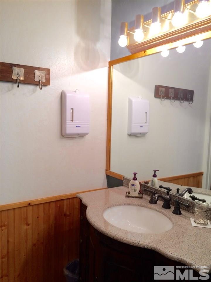 233 Clubhouse Circle Stateline, NV 89449 - Photo 8 of 28 a bathroom with a sink and a mirror