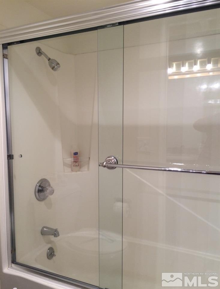 233 Clubhouse Circle Stateline, NV 89449 - Photo 9 of 28 a bathroom with a shower