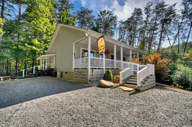 front view of a house with a yard