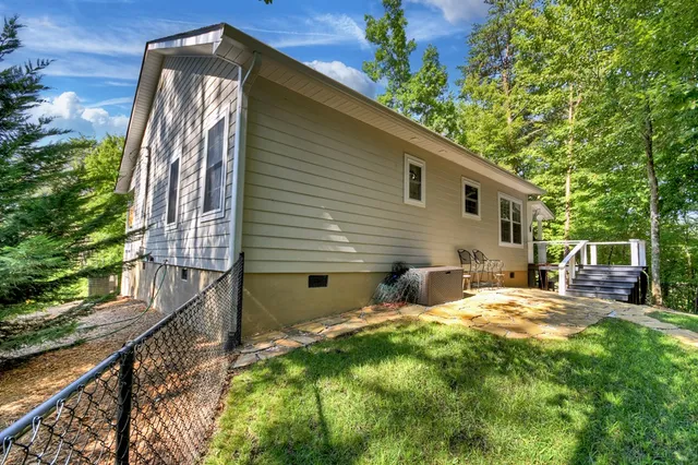 a backyard of a house with seating space