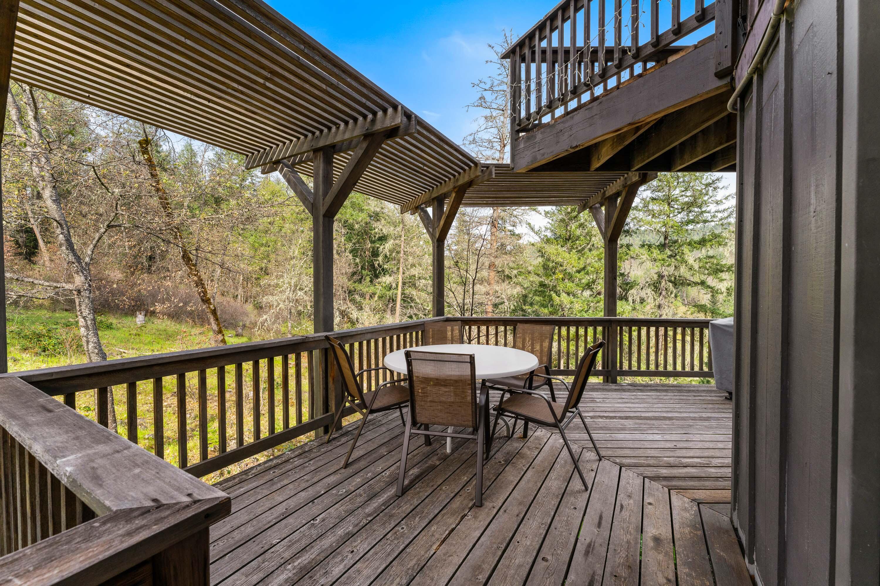 7201 Crowfoot Road Trail, OR 97541 - Photo 42 of 56 a view of a two chairs in the balcony