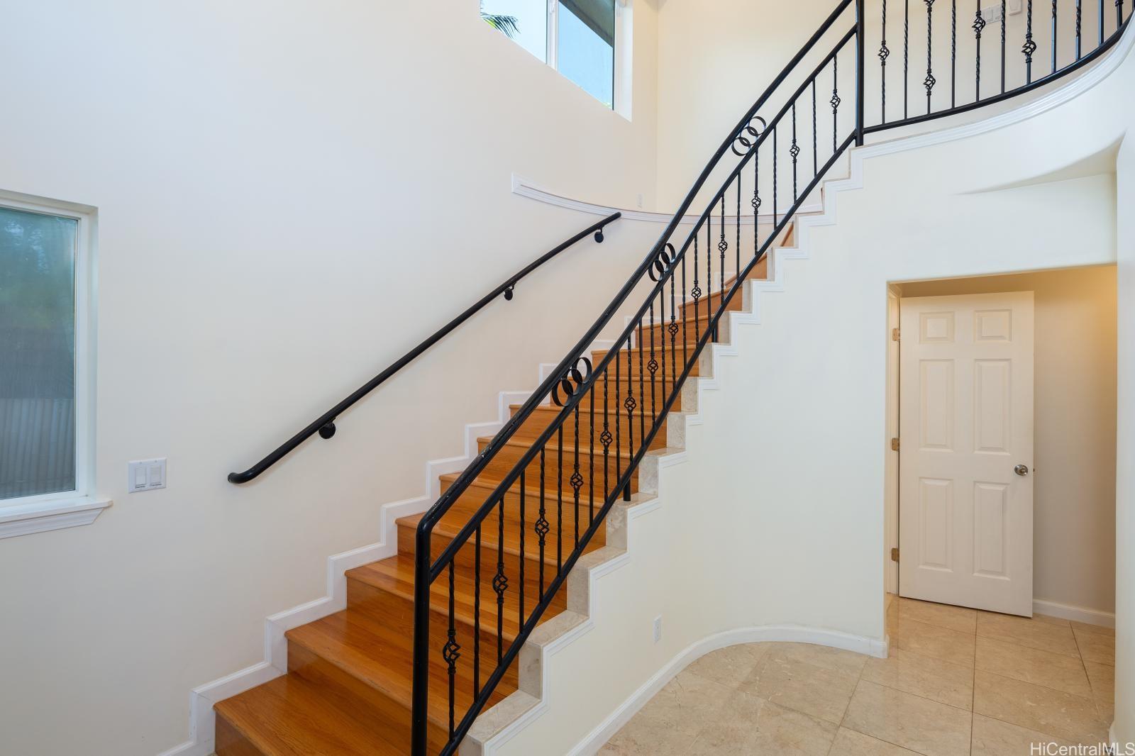 841 20th Avenue Honolulu, HI 96816 - Photo 2 of 8 a view of staircase with wooden floor and white walls