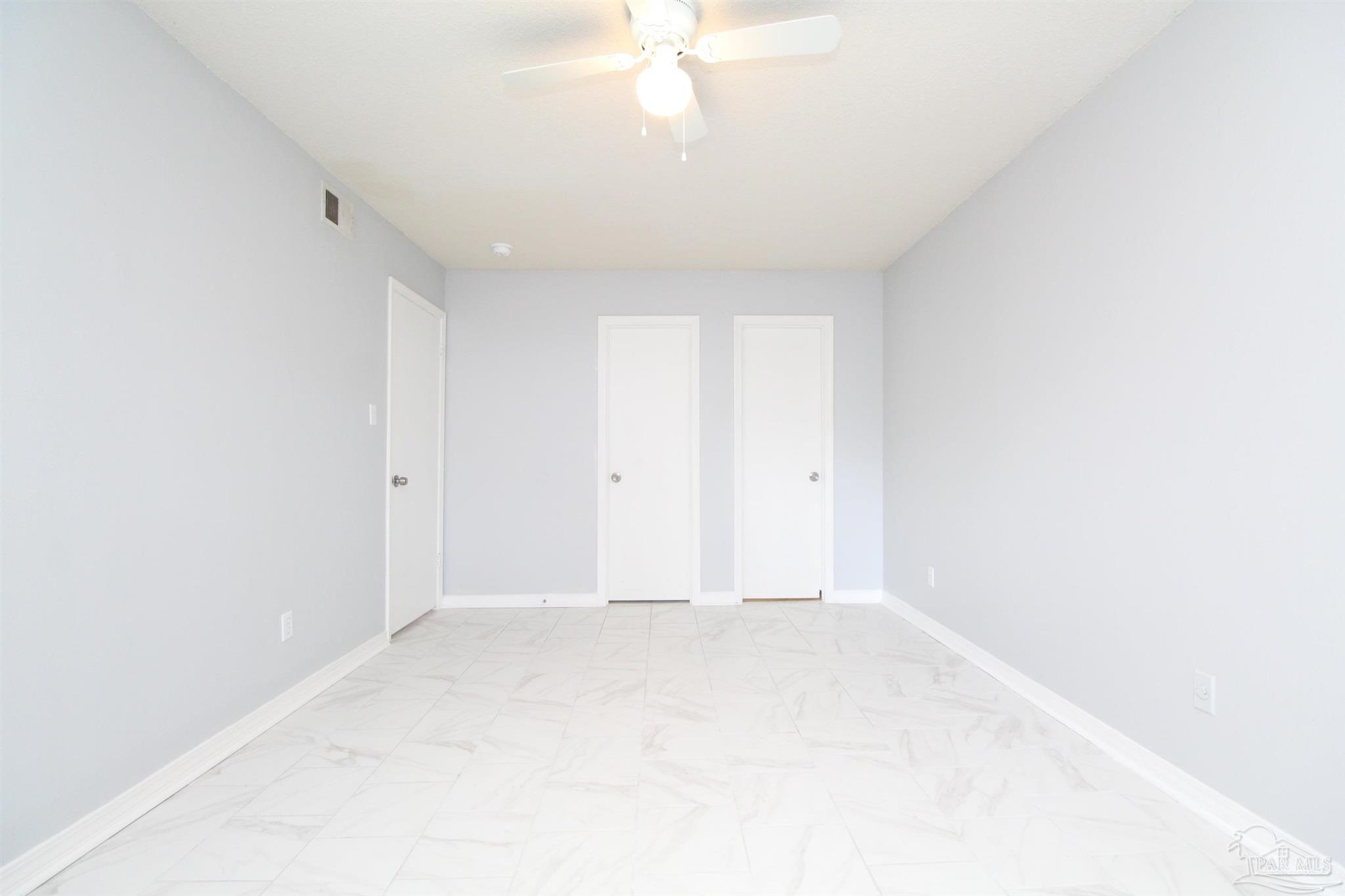 7116 Pearson Road, Unit C Pensacola, FL 32526 - Photo 12 of 20 a view of an empty room