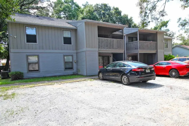 a car parked in front of a house