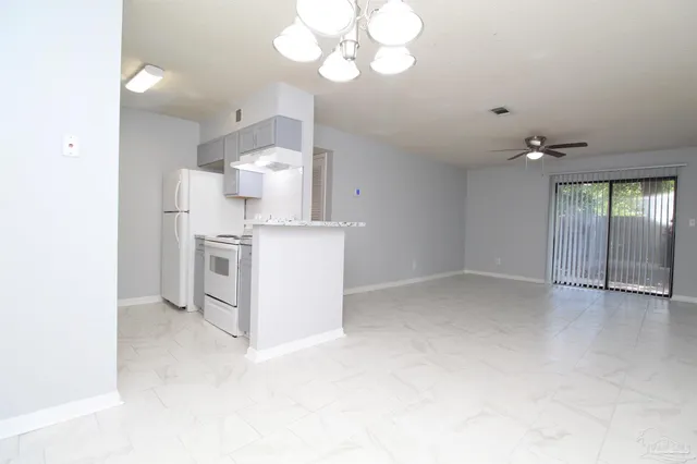 a view of cabinets and window