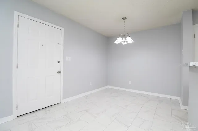 a view of a chandelier in a room