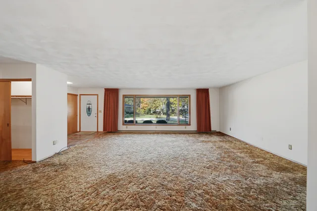 a view of an empty room with window