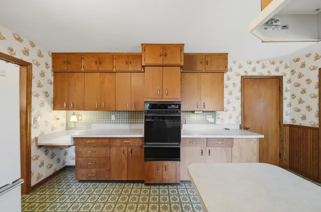 a view of fireplace and window