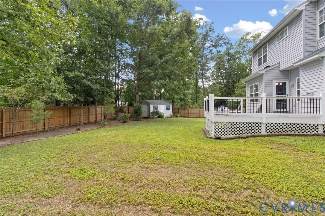 7807 Clover Ridge Place Chesterfield, VA 23832 - Photo 47 of 51 Expansive backyard featuring a wood privacy fence,