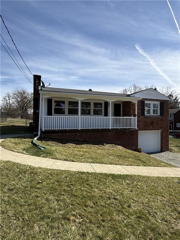 1681 Robbins Station Road Irwin, PA 15642 - Photo 1 of 27 a view of house with backyard and porch