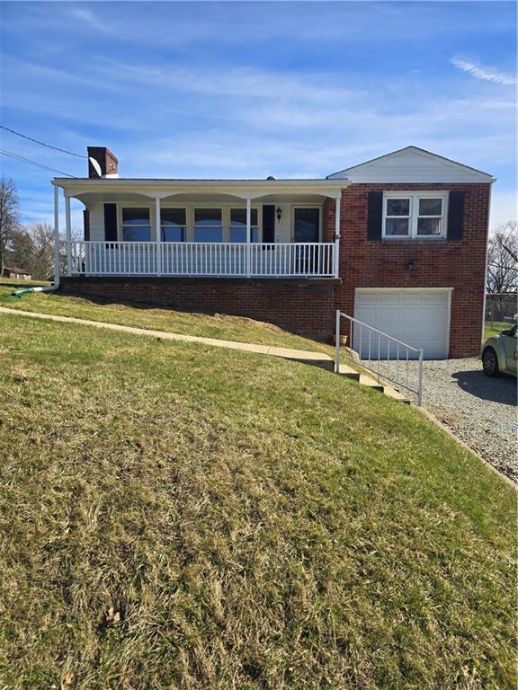 1681 Robbins Station Road Irwin, PA 15642 - Photo 2 of 27 a view of a house with a swimming pool and porch