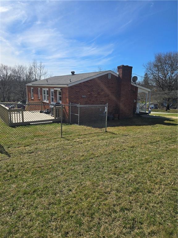 1681 Robbins Station Road Irwin, PA 15642 - Photo 4 of 27 a house view with a sitting space and garden