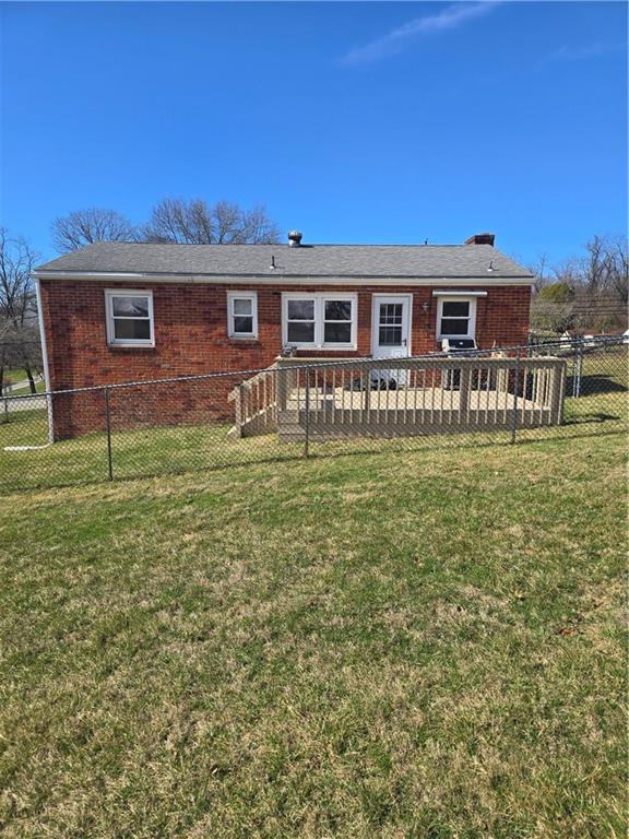 1681 Robbins Station Road Irwin, PA 15642 - Photo 5 of 27 a front view of a house with a yard