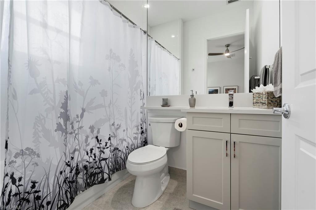 12083 Azalea Way Naples, FL 34120 - Photo 25 of 48 2nd ensuite bathroom with tub