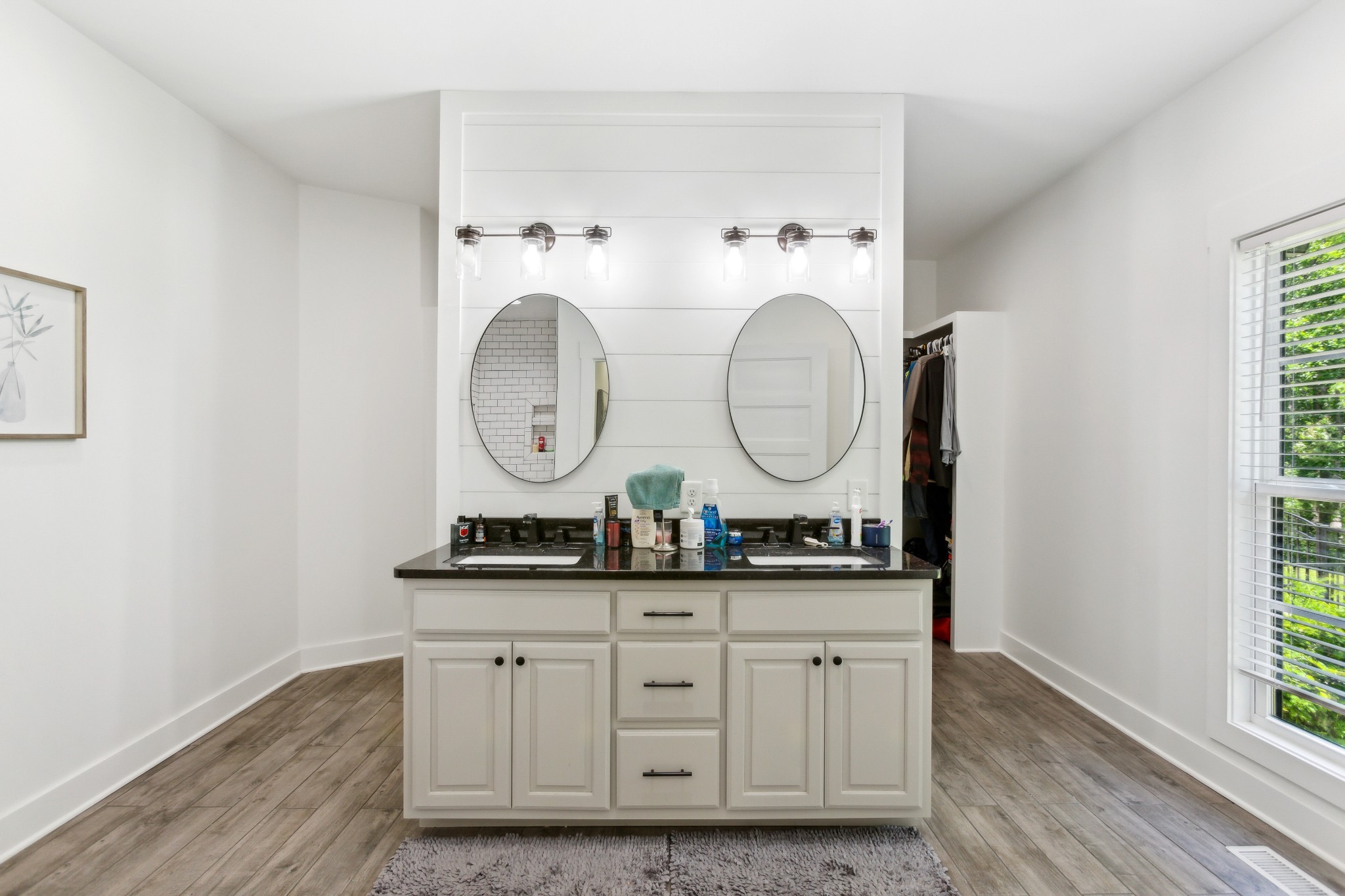 1930 Williams Road Lafayette, TN 37083 - Photo 18 of 41 a room with round mirror and clock on the wall