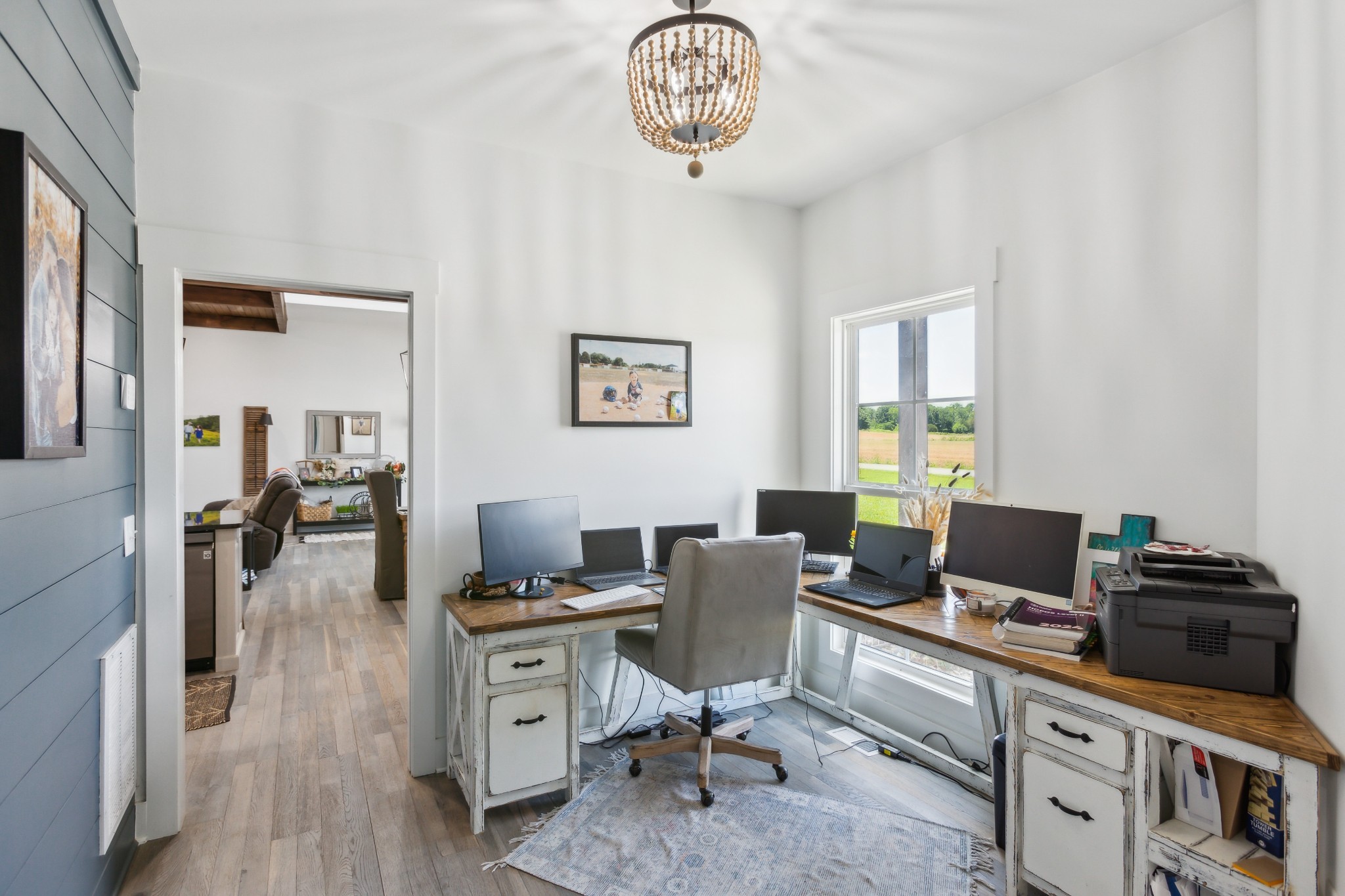 1930 Williams Road Lafayette, TN 37083 - Photo 23 of 41 a workspace with furniture and wooden floor