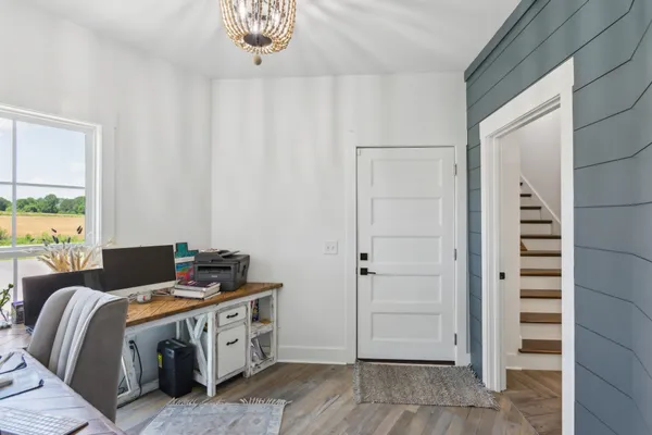 a bed room with a bed and a window