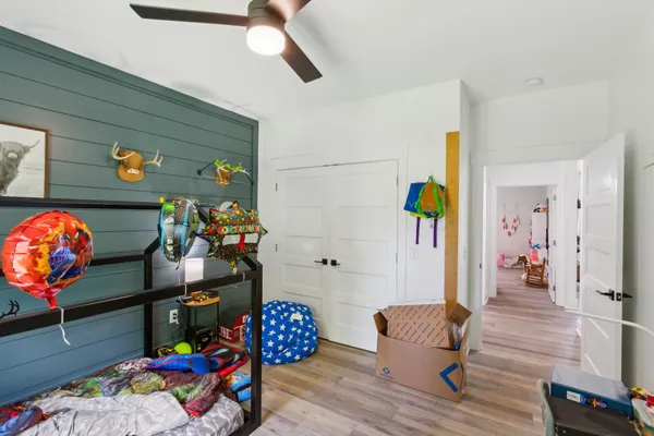 a room with toys and stairs