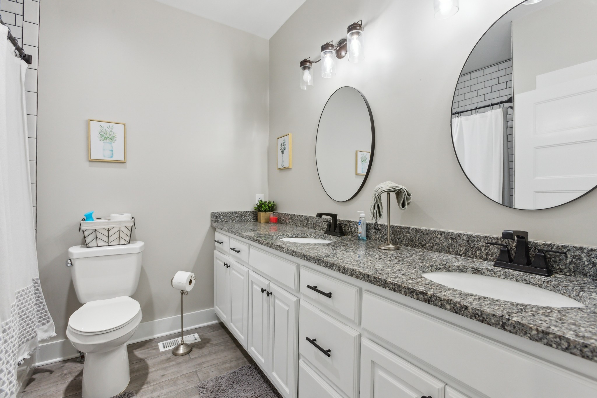 1930 Williams Road Lafayette, TN 37083 - Photo 33 of 41 a bathroom with a toilet a sink and a mirror