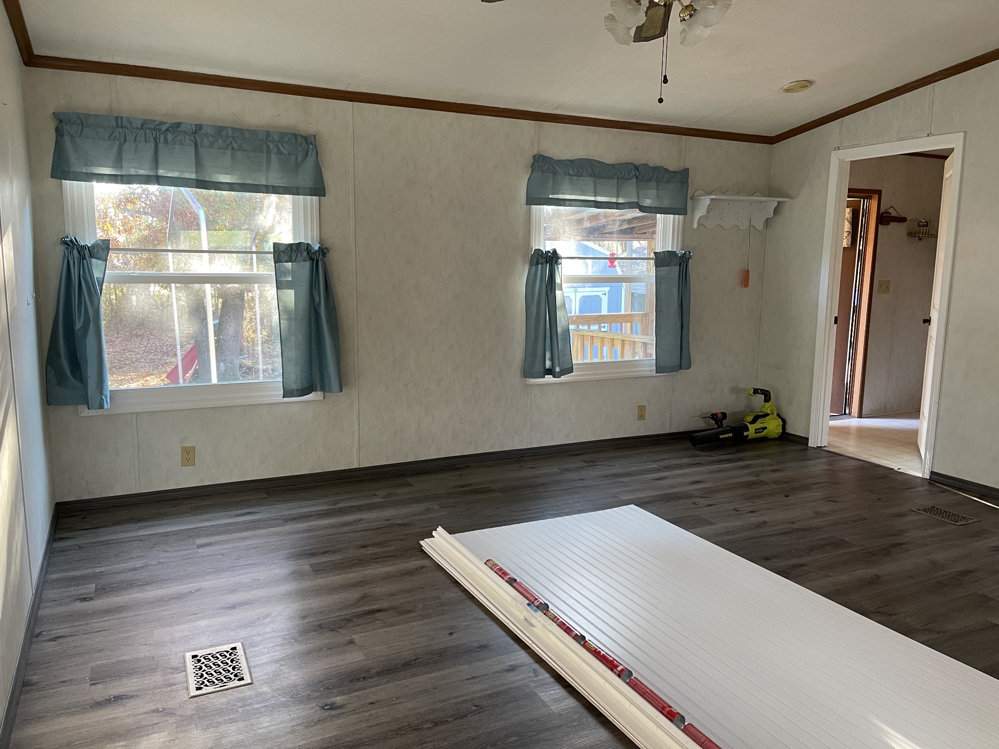 274 Hester Road Portland, TN 37148 - Photo 12 of 18 a view of an empty room with wooden floor and a window