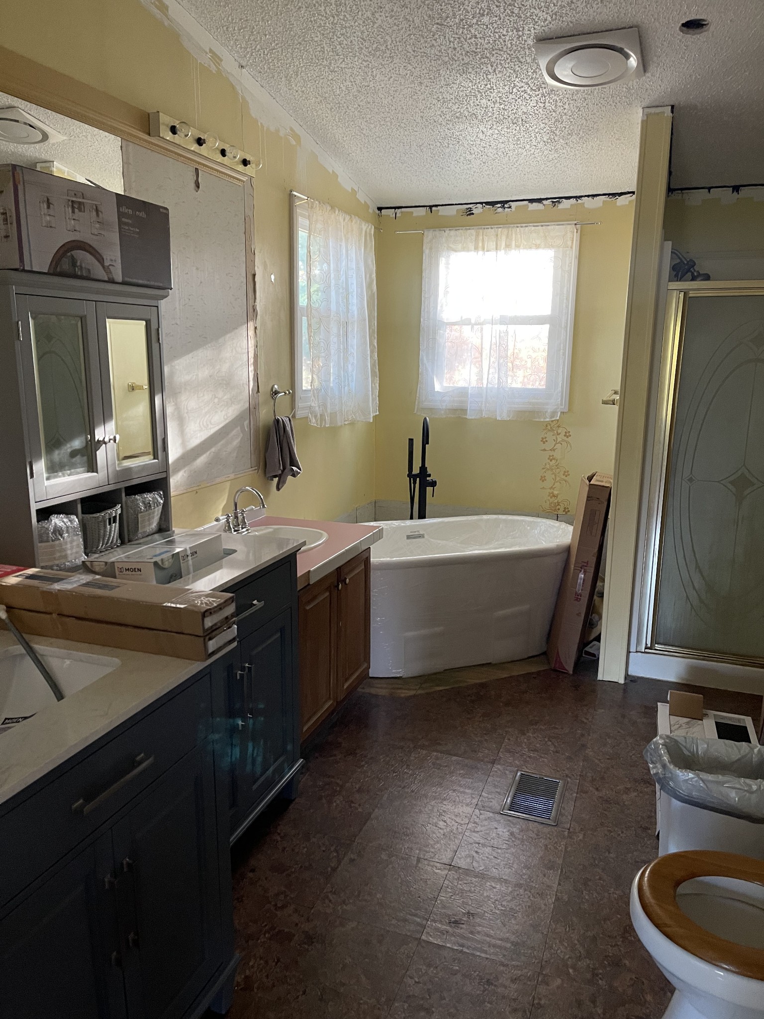 274 Hester Road Portland, TN 37148 - Photo 14 of 18 a bathroom with a double vanity sink a mirror and a bathtub