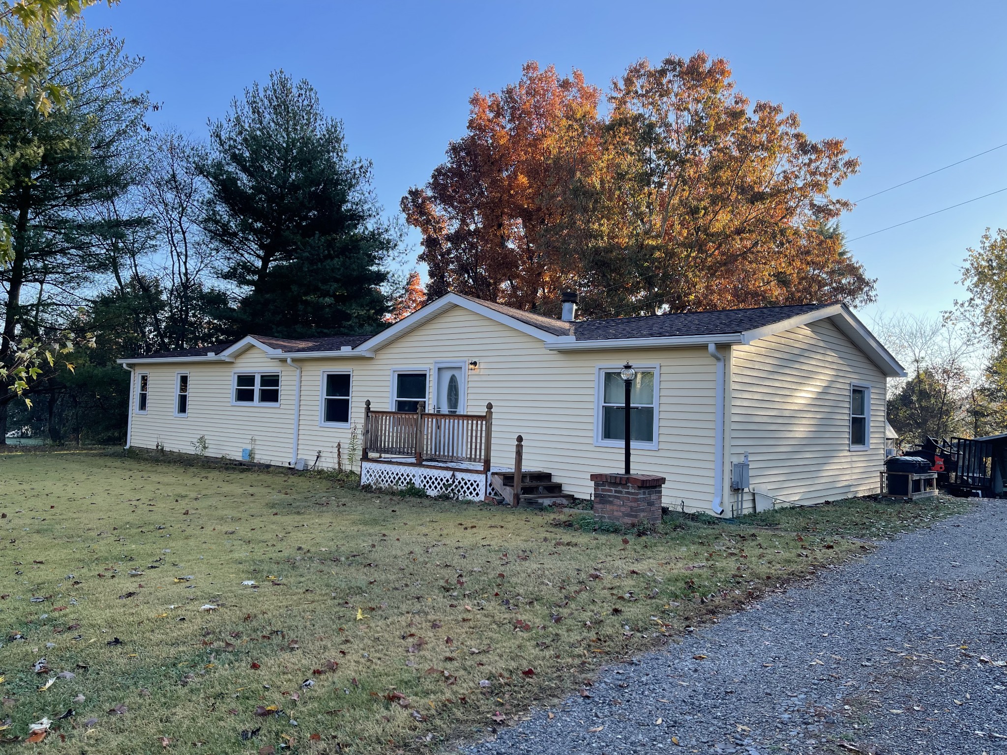 274 Hester Road Portland, TN 37148 - Photo 2 of 18 a view of a house with a yard and large tree