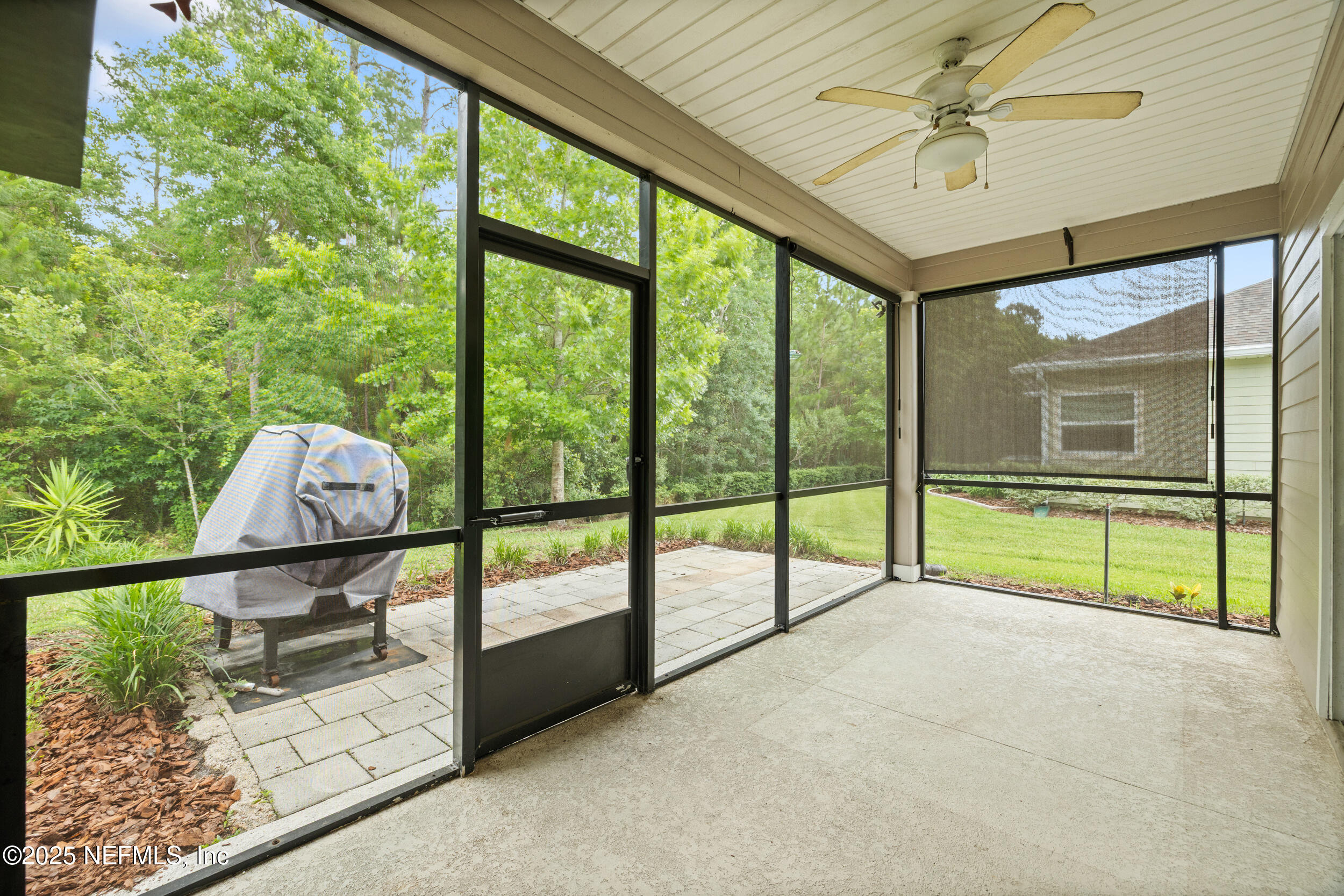 221 St Kitts Loop St. Augustine, FL 32092 - Photo 23 of 44 a view of an entryway with a garden