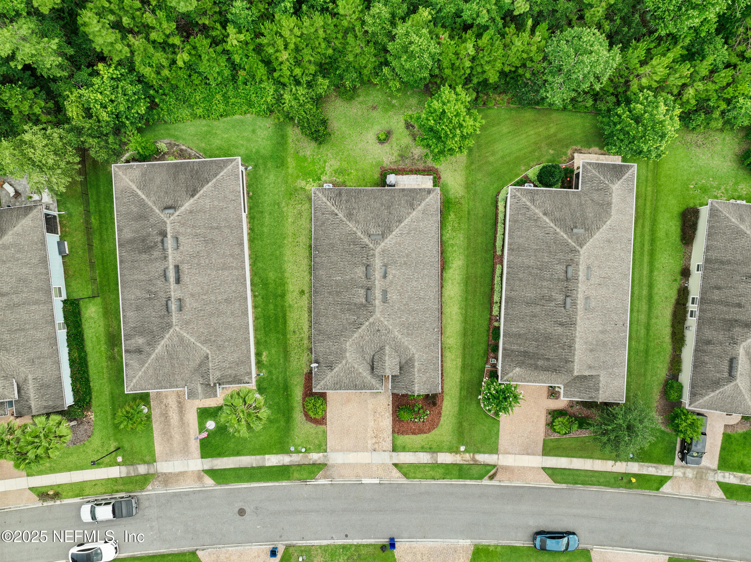 221 St Kitts Loop St. Augustine, FL 32092 - Photo 33 of 44 front view of a brick building with plants