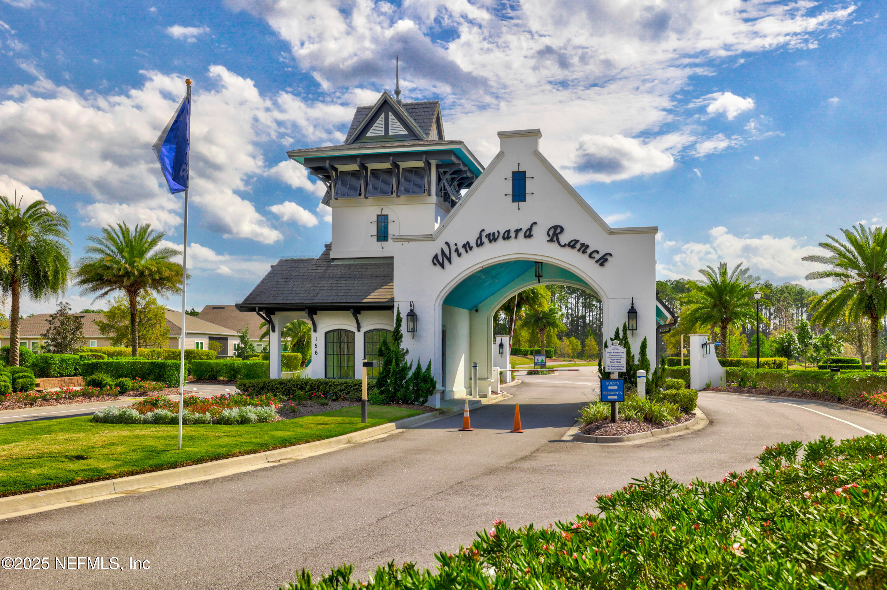 221 St Kitts Loop St. Augustine, FL 32092 - Photo 35 of 44 a front view of a house with a garden