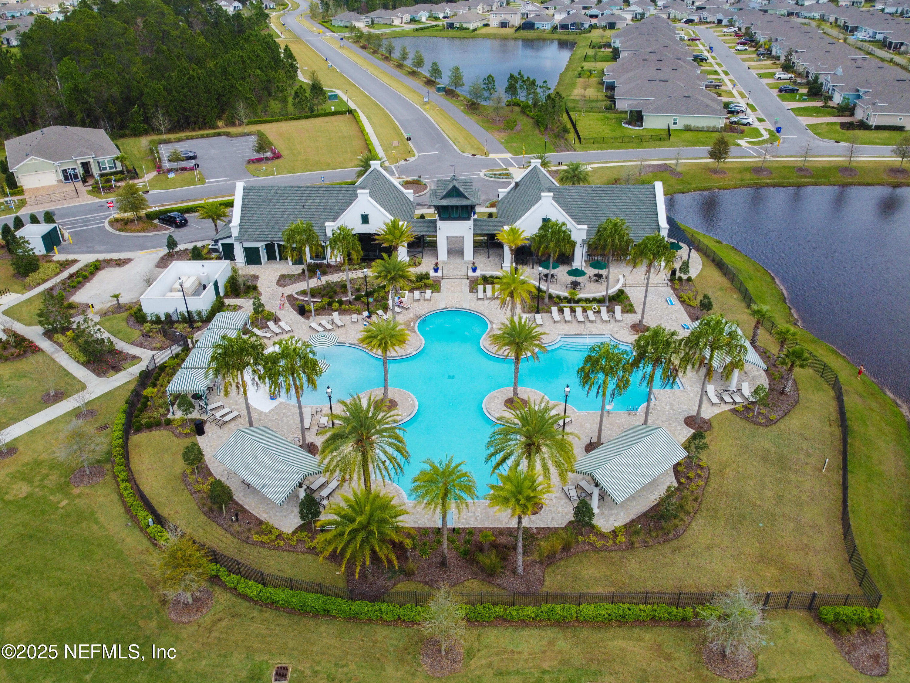 221 St Kitts Loop St. Augustine, FL 32092 - Photo 39 of 44 an aerial view of a swimming pool with outdoor seating