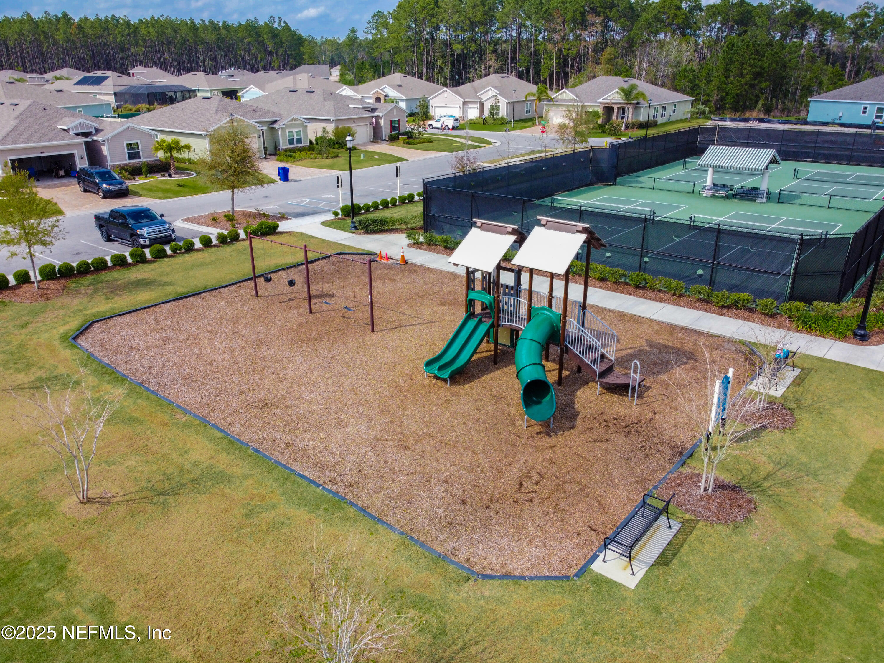 221 St Kitts Loop St. Augustine, FL 32092 - Photo 43 of 44 swimming pool view with an outdoor seating