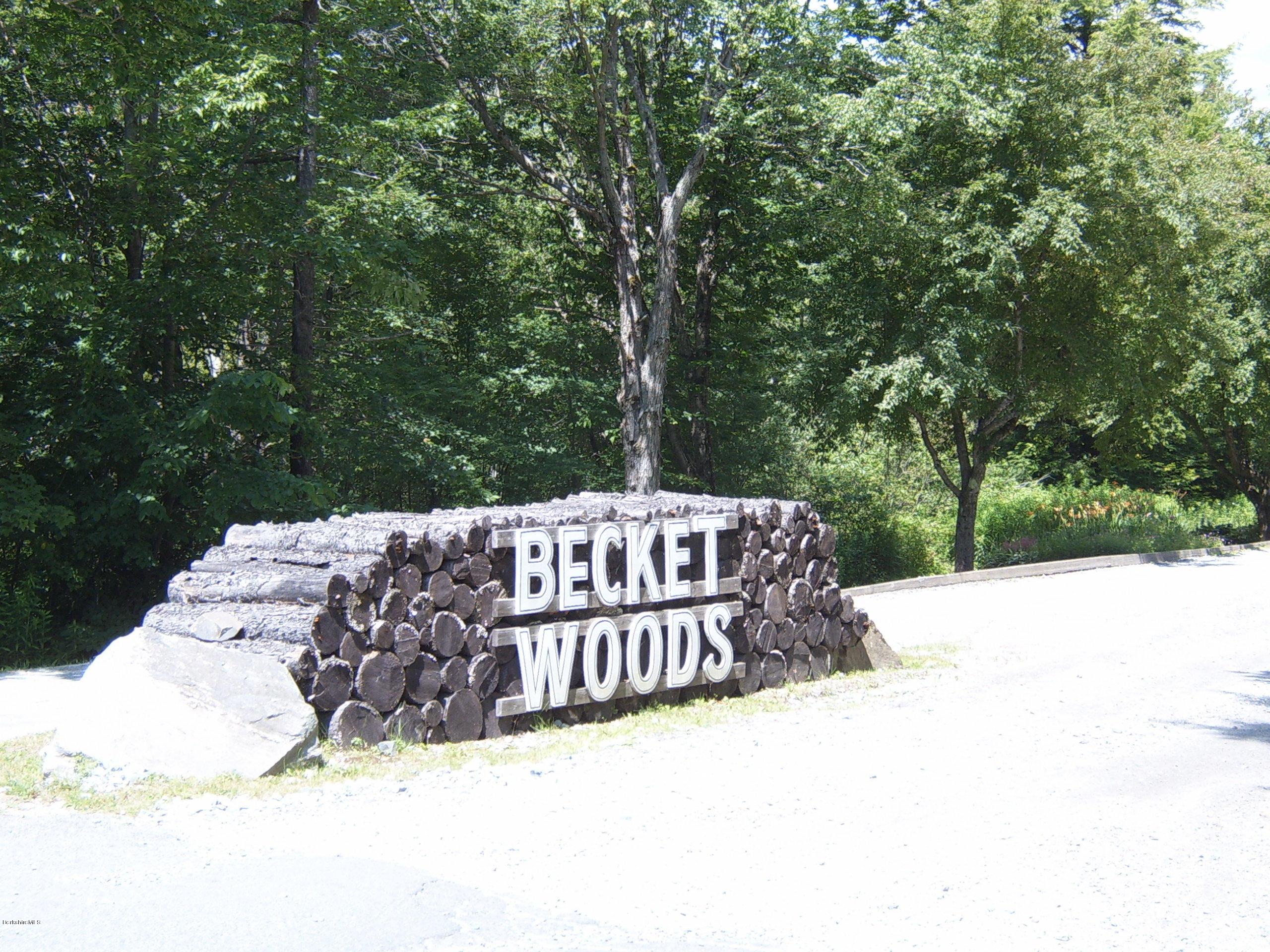 Woodmere Road Becket, MA 01223 - Photo 1 of 4 a street view with a bench