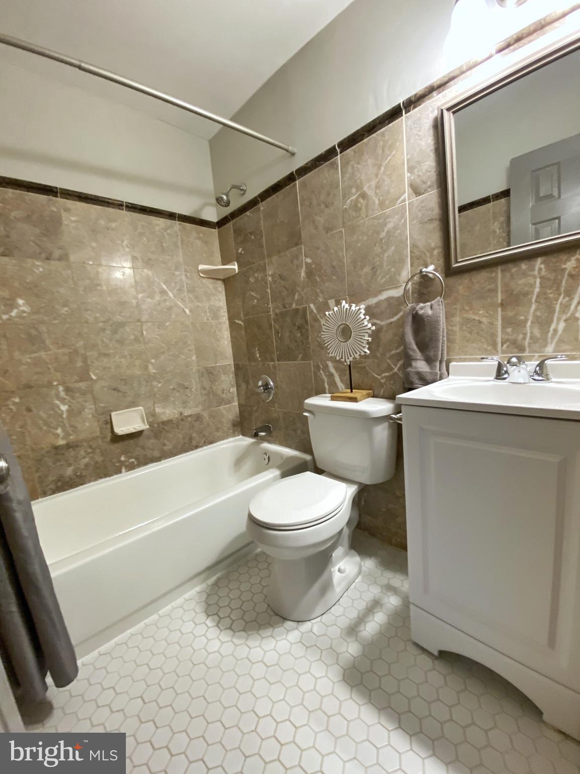 6101 Ridgeview Avenue Baltimore, MD 21206 - Photo 17 of 36 Hall Bath with custom tile