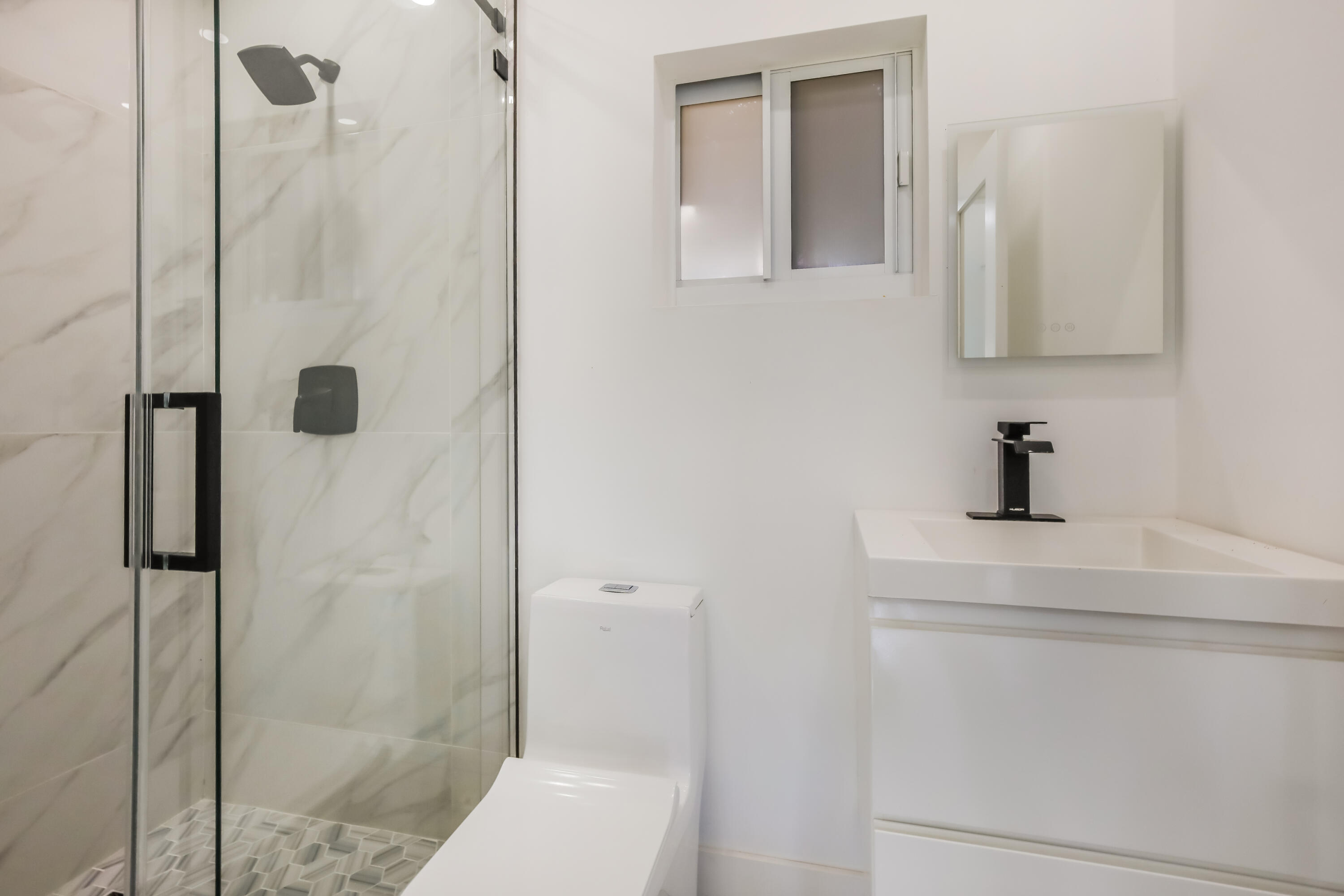4701 Southwest 7th Street Miami, FL 33134 - Photo 10 of 17 11-photo-Main-Bathroom-89f1f975-4f64-4b7