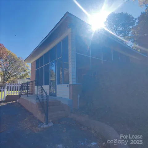 a view of a swimming pool with an ocean view