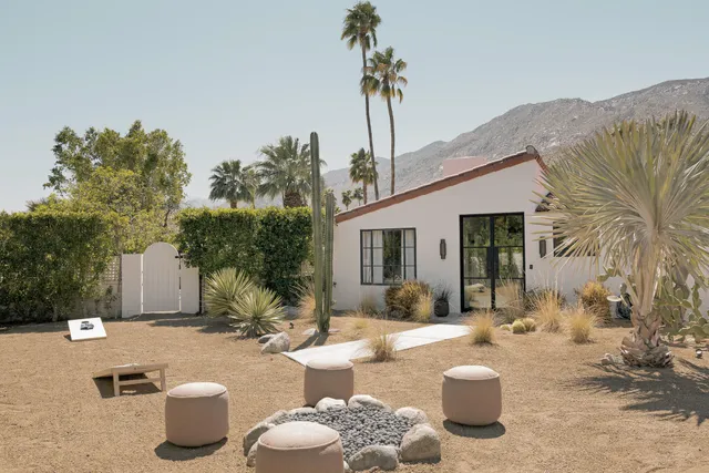 a bathroom with a shower and a sink