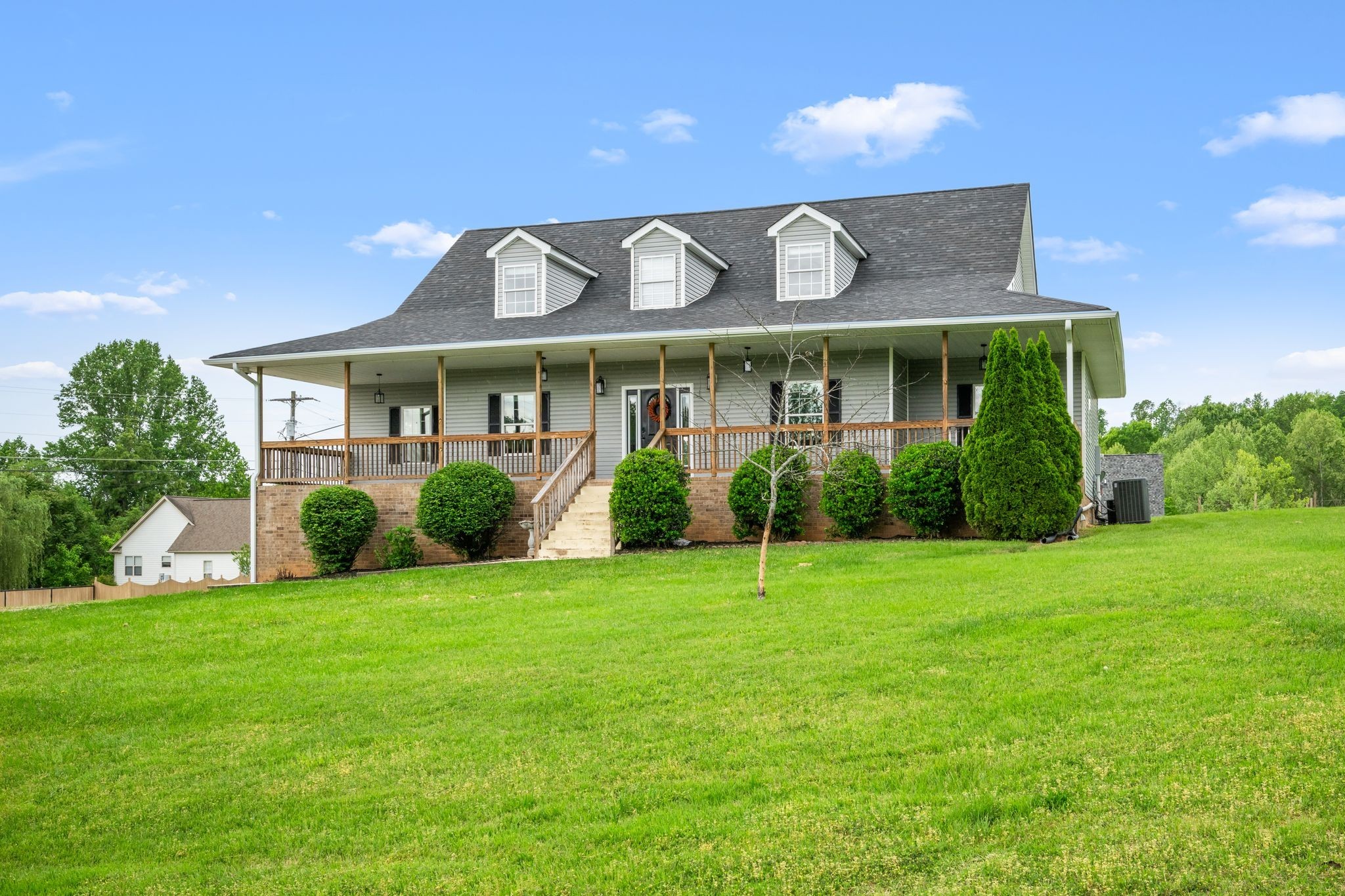 830 Blakemore Road Dickson, TN 37055 - Photo 3 of 22 a view of a house with a garden