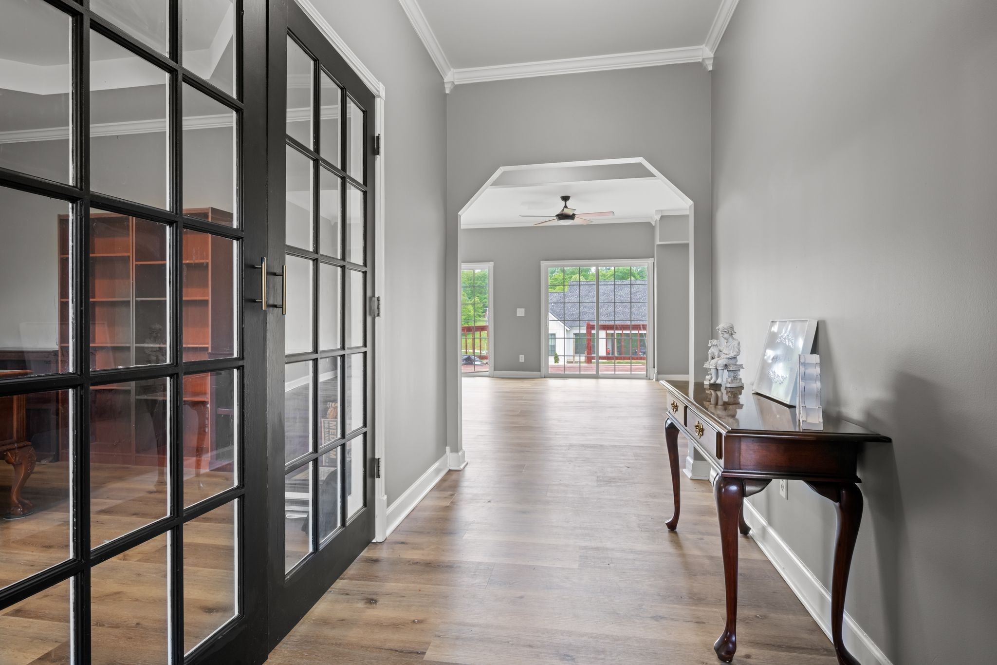 830 Blakemore Road Dickson, TN 37055 - Photo 5 of 22 a view of a hallway to dining room and wooden floor