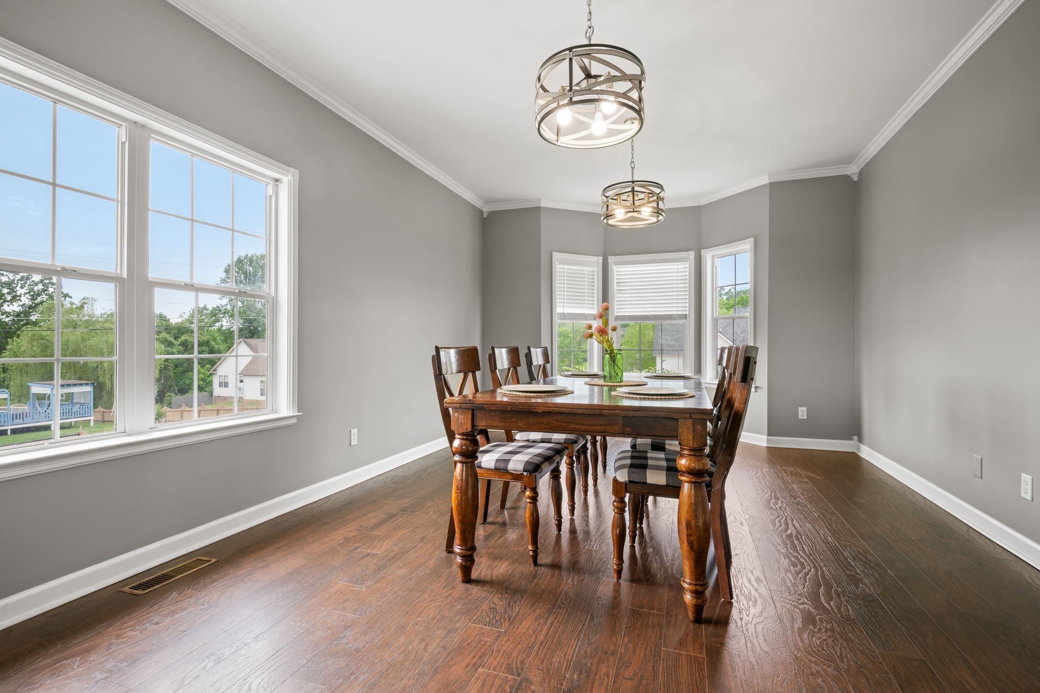830 Blakemore Road Dickson, TN 37055 - Photo 9 of 22 a view of a dining room with furniture window and wooden floor