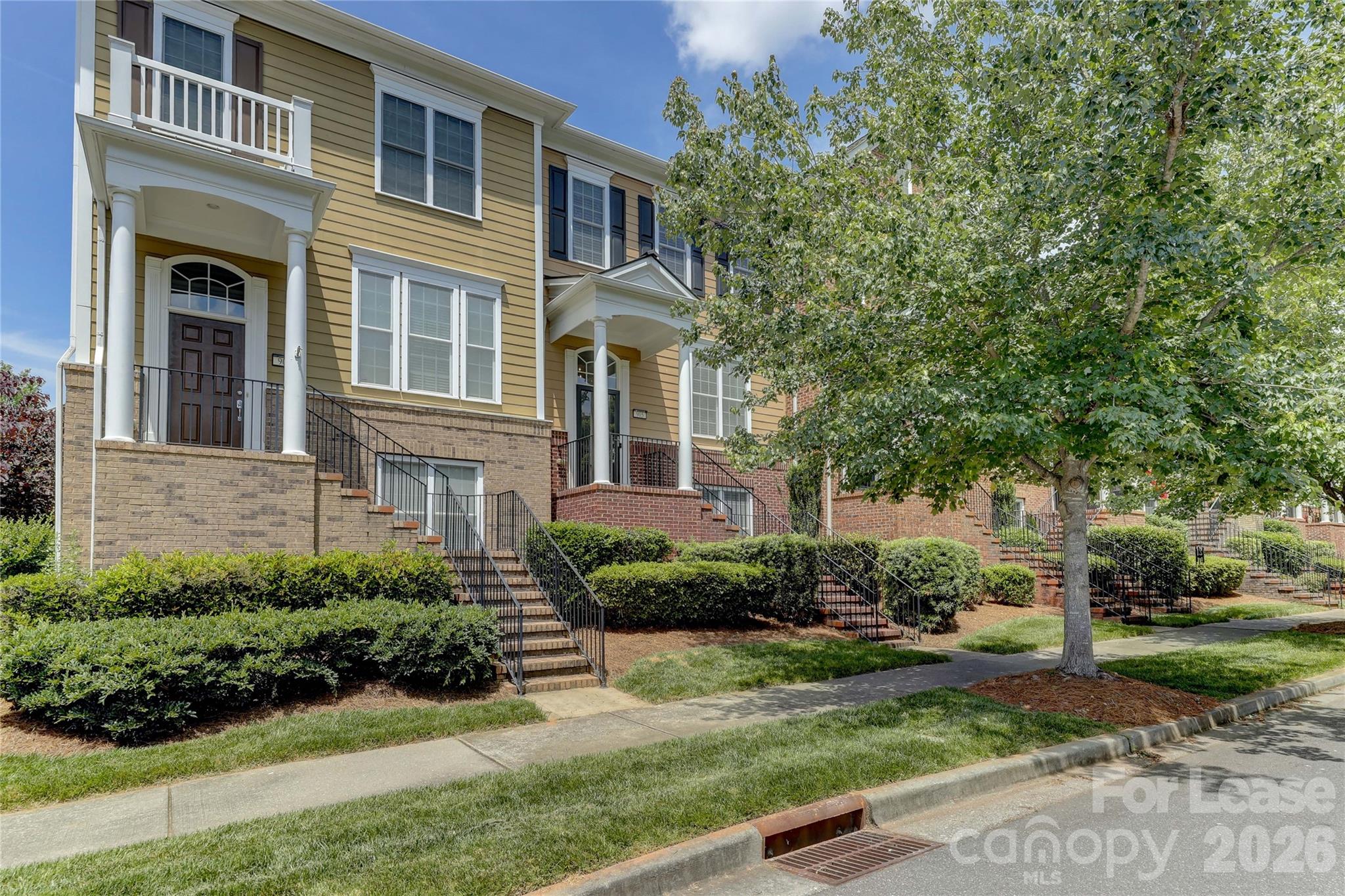 905 Lyndley Drive Fort Mill, SC 29708 - Photo 3 of 42 a front view of a house with a yard