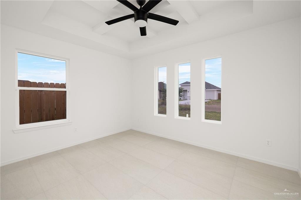 6050 Reymundo Street Edinburg, TX 78542 - Photo 10 of 11 a view of an empty room with a window