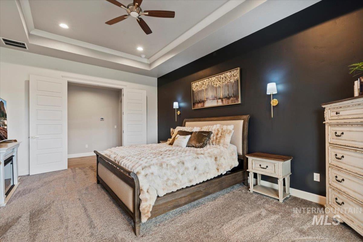 15465 Syrah Court Caldwell, ID 83607 - Photo 19 of 45 Bedroom with a ceiling fan, light carpet, and recessed lighting