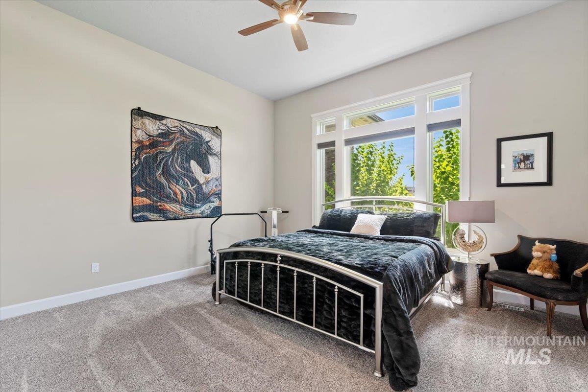 15465 Syrah Court Caldwell, ID 83607 - Photo 26 of 50 Bedroom with carpet flooring and a ceiling fan