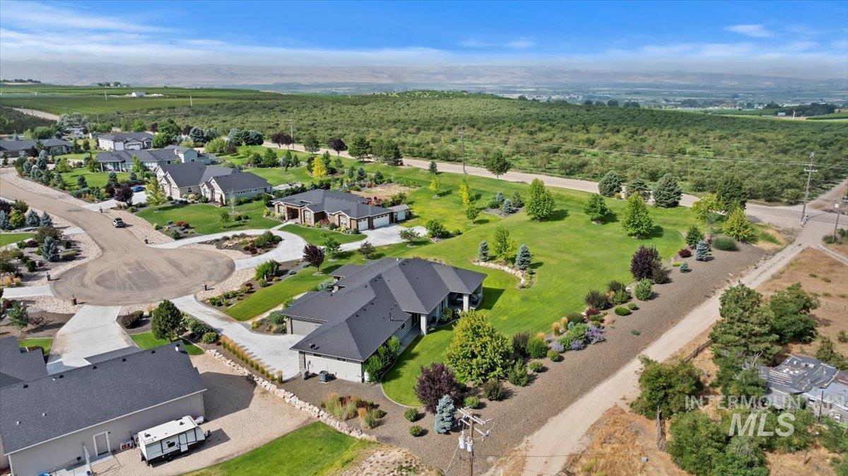 15465 Syrah Court Caldwell, ID 83607 - Photo 37 of 45 View of property location with a forest and nearby suburban area